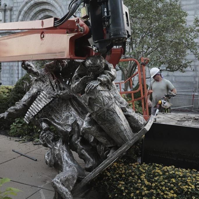 A vandal badly damaged a statue outside a St. Louis cathedral, police say